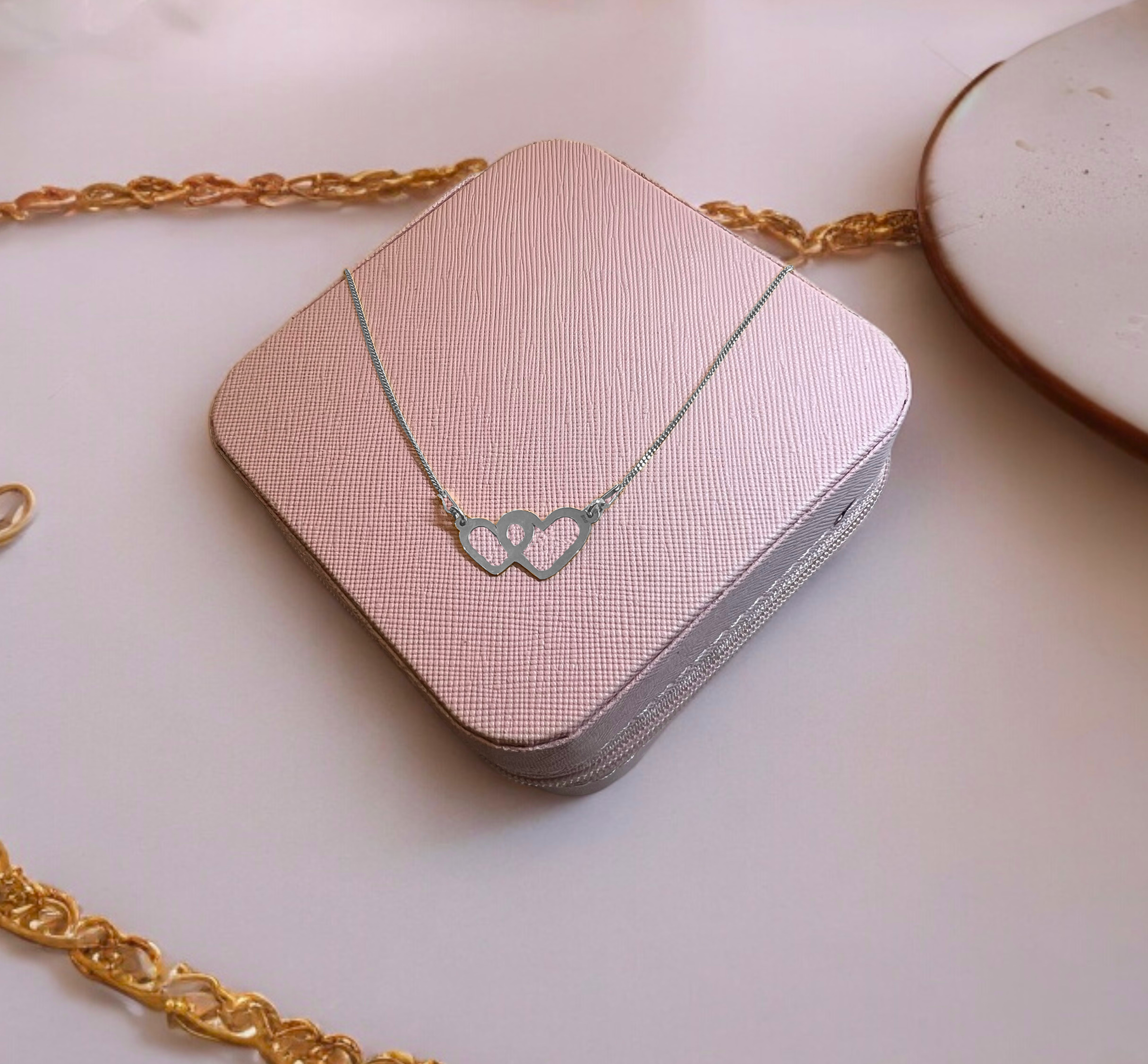 Naszyjnik dwa serca przeplatane